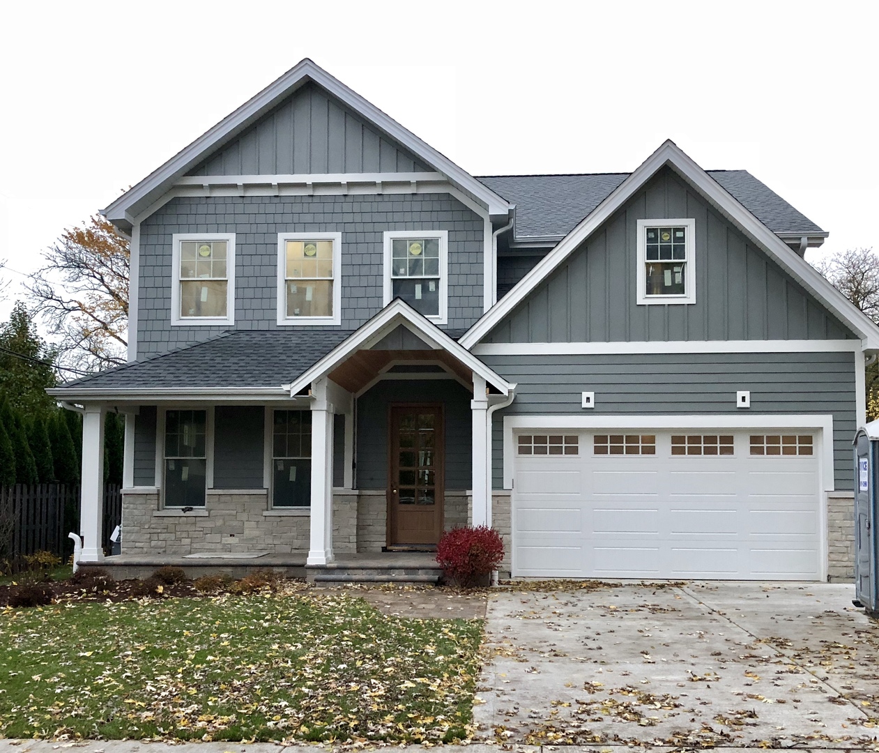 928 Hunter Road Glenview, IL 60025 - Photo 2 of 24 a front view of a house with garden