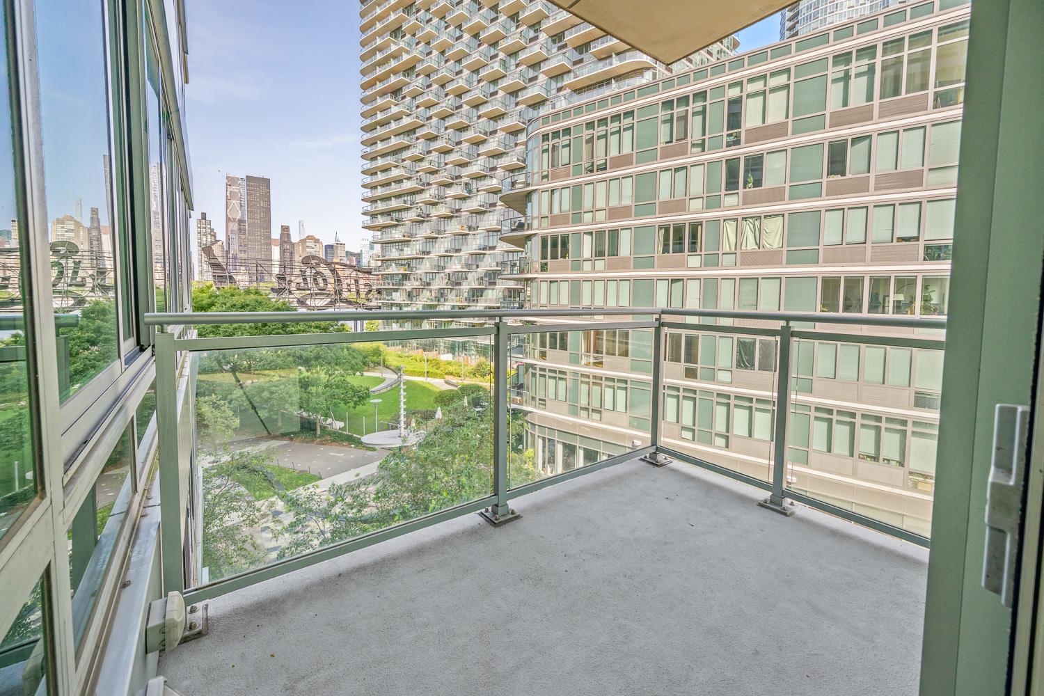 46-30 Center Boulevard, Unit 401 Queens, NY 11109 - Photo 8 of 18 a view of a city from a balcony