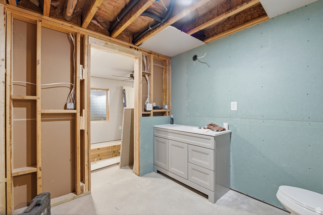 2567 West Rim Rock Drive Stockton, UT 84071 - Photo 40 of 64 Framed interior space with exposed ceiling joists and partial drywall installation