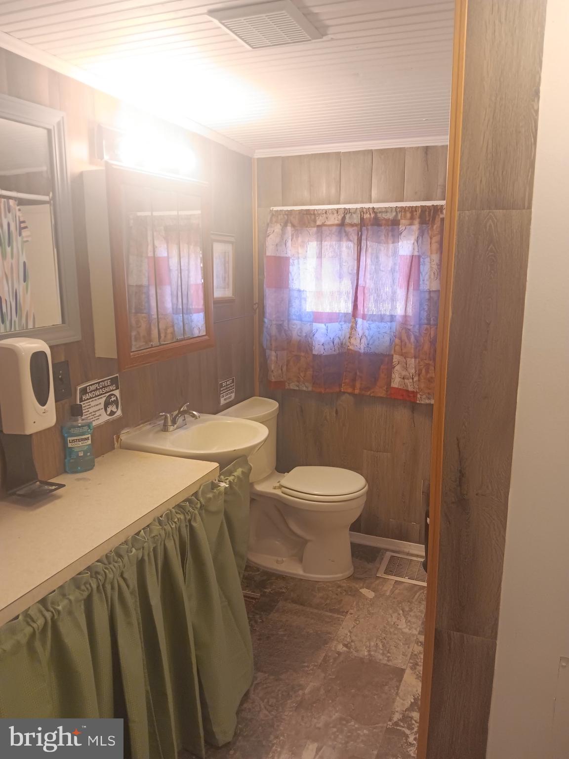 72 Dries Road Reading, PA 19605 - Photo 11 of 11 a bathroom with a sink and a mirror