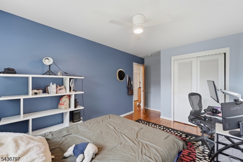 17 Arthur Drive Rutherford, NJ 07070 - Photo 27 of 45 a bedroom with bed and a window