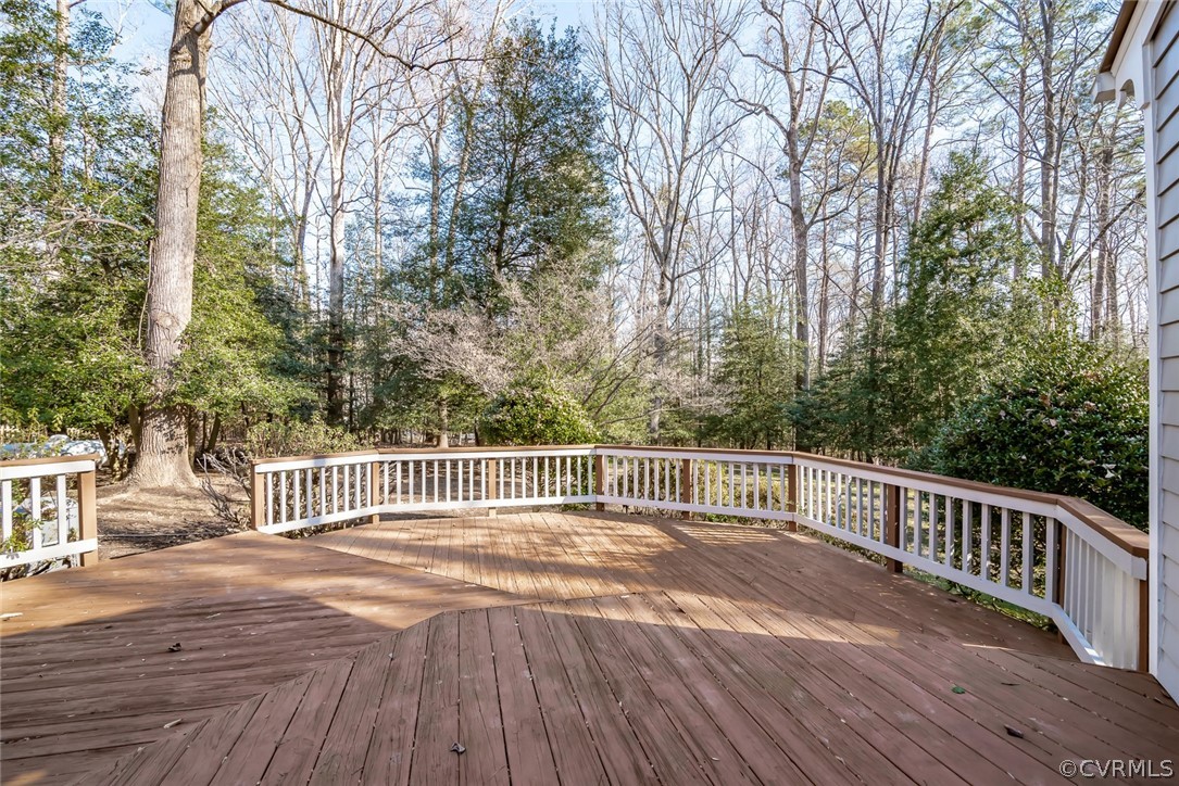 3531 Buckhead Road Midlothian, VA 23113 - Photo 40 of 42 a deck view with wooden floor and fence next to a yard