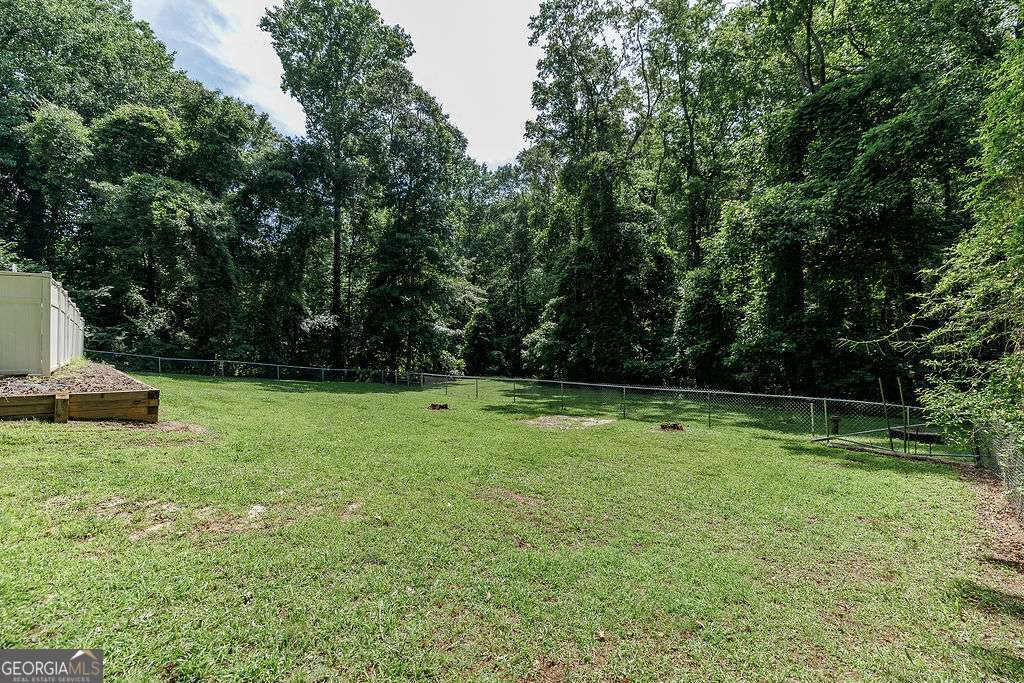226 Baker Street Statham, GA 30666 - Photo 61 of 63 a view of outdoor space with deck and yard