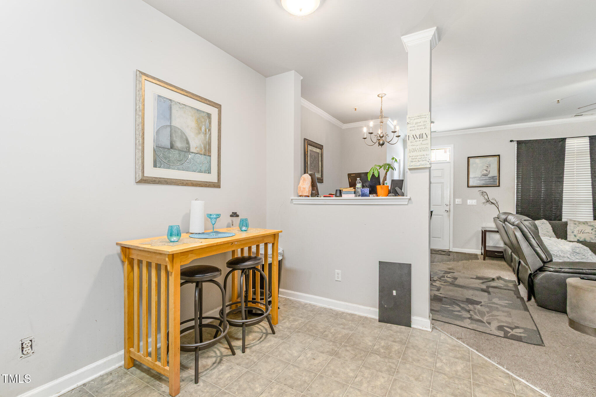 2220 Raven Road, Unit 104 Raleigh, NC 27614 - Photo 11 of 22 a view of a dining room with furniture