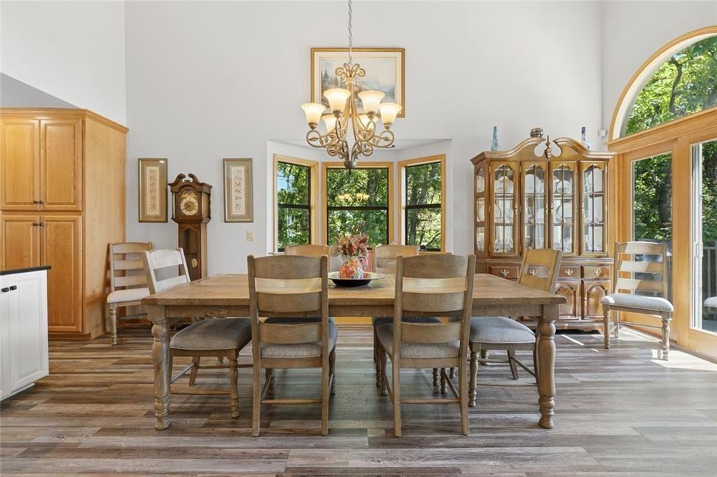 251 Panorama Point Jasper, GA 30143 - Photo 25 of 93 a view of a dining room with furniture a chandelier and wooden floor