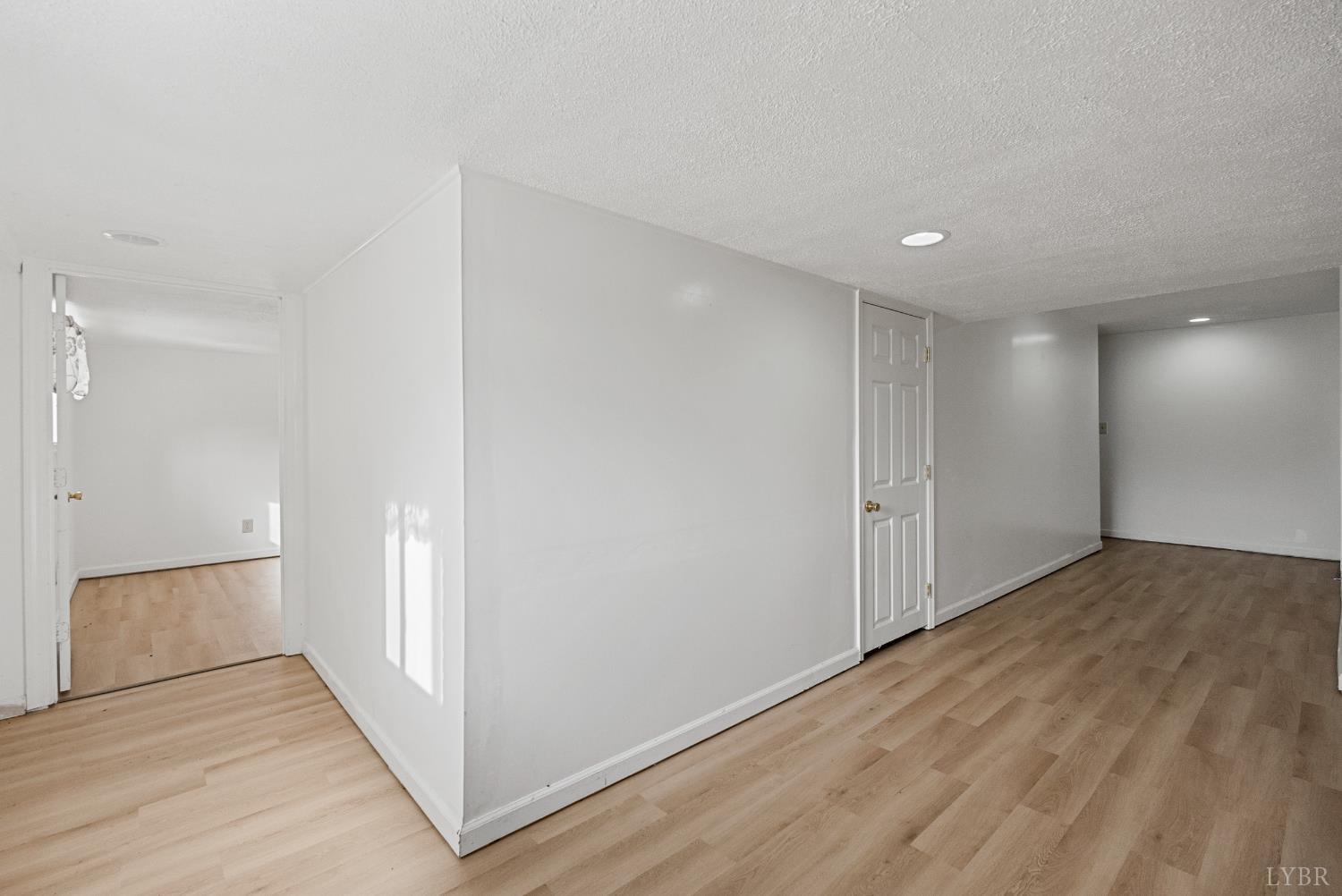 294 Spring Garden Road Monroe, VA 24574 - Photo 32 of 56 a view of hallway with wooden floor