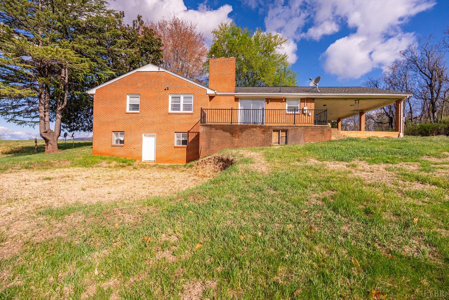 294 Spring Garden Road Monroe, VA 24574 - Photo 45 of 56 a view of a back yard of the house