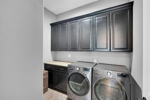a view of walk in closet and bedroom