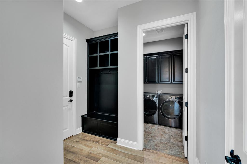 5811 Limestone Lane Midlothian, TX 76065 - Photo 27 of 40 a view of walk in closet and bedroom
