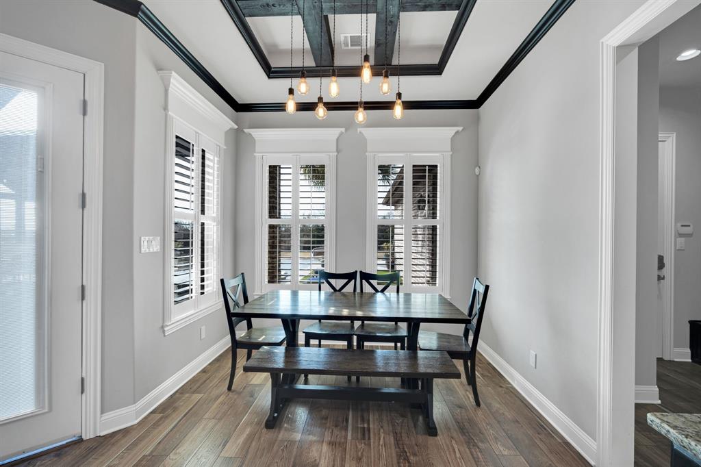 5811 Limestone Lane Midlothian, TX 76065 - Photo 32 of 40 a view of a dining room with furniture window and wooden floor