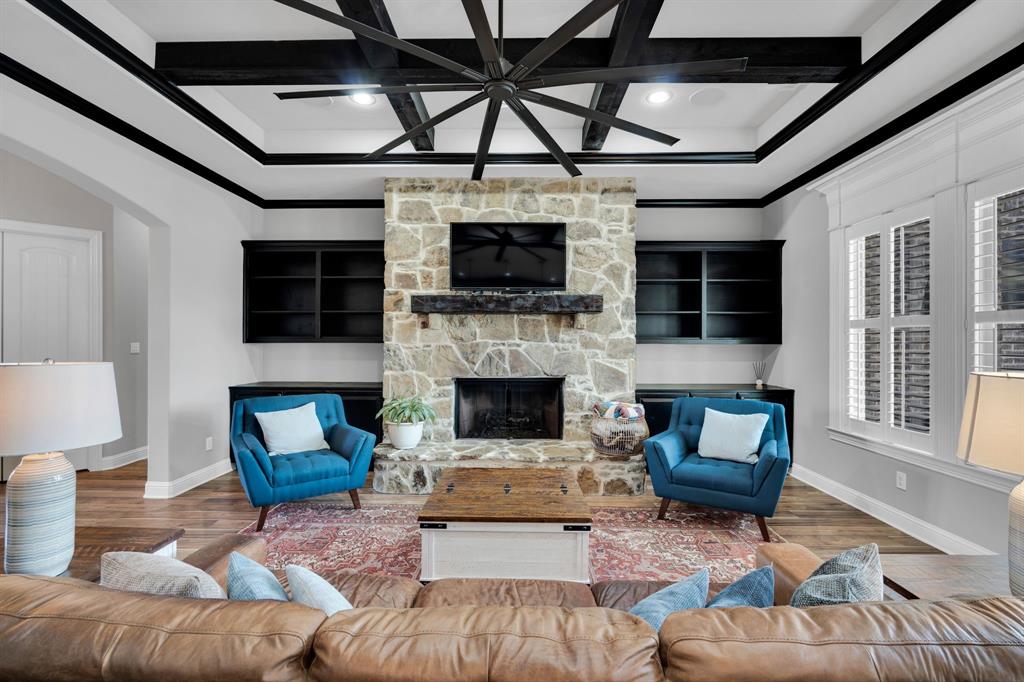 5811 Limestone Lane Midlothian, TX 76065 - Photo 35 of 40 a living room with furniture and a fireplace