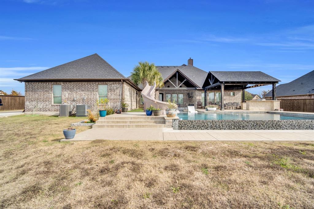 5811 Limestone Lane Midlothian, TX 76065 - Photo 9 of 40 a view of a house with a yard