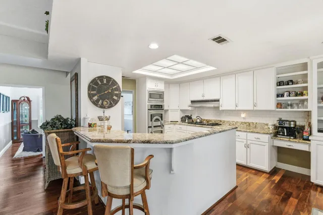 a bedroom with furniture and a bed