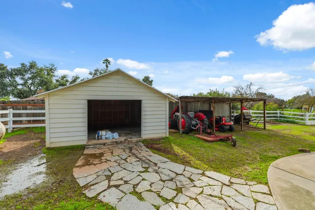 a view of a swimming pool with an outdoor seating