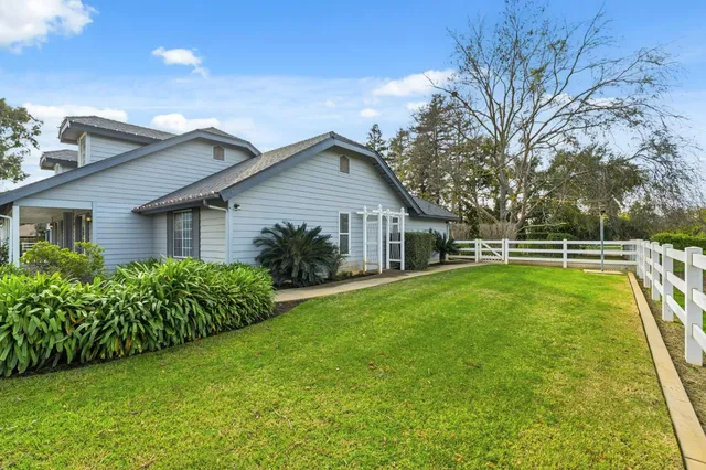 a view of a city with lawn chairs