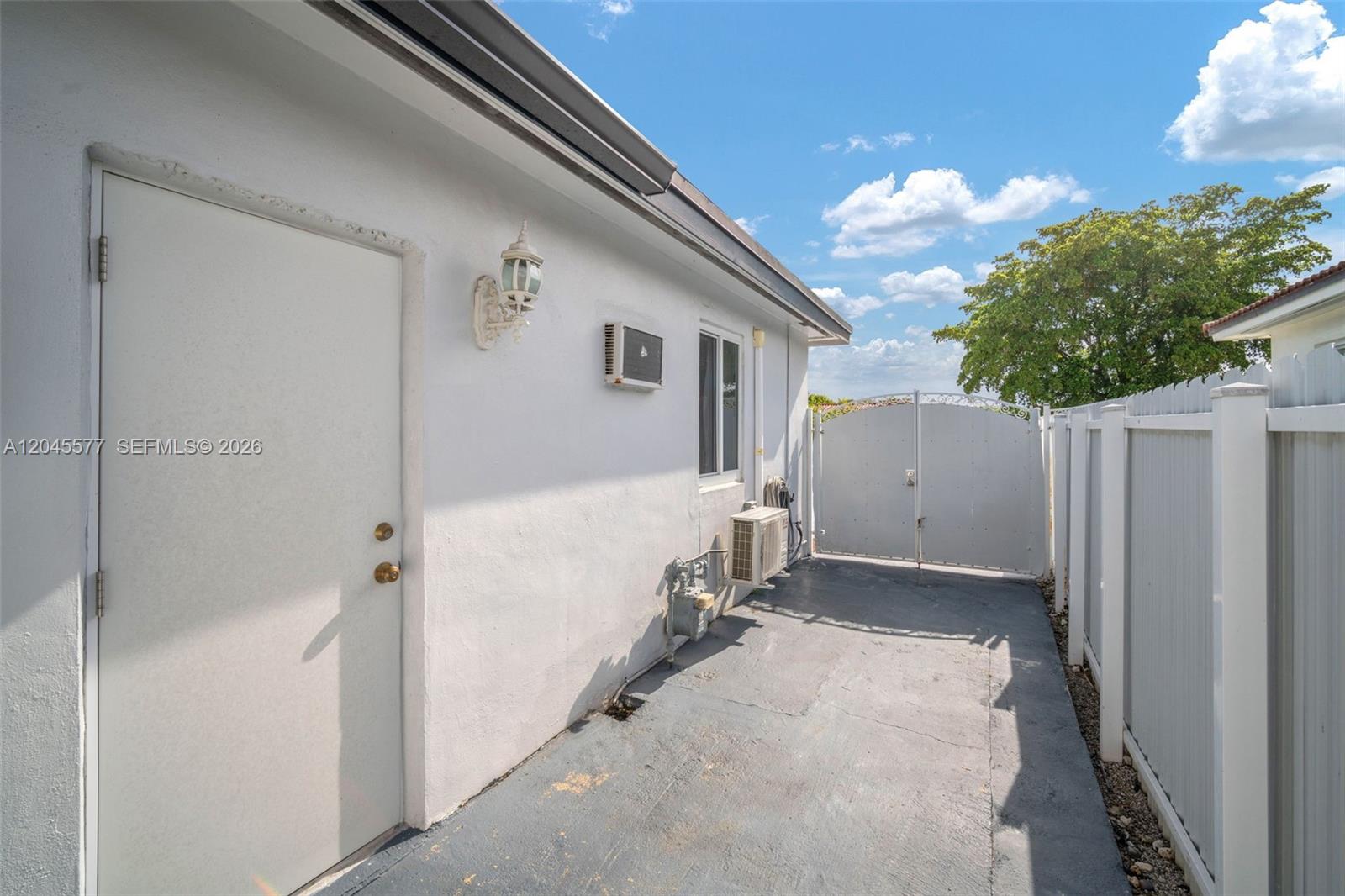 1807 Southwest 102nd Place Miami, FL 33165 - Photo 50 of 52 side gate entrance