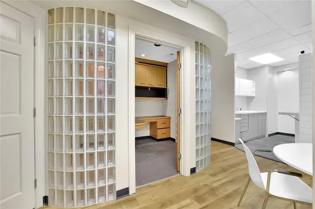 a living room with a couch and a view of living room