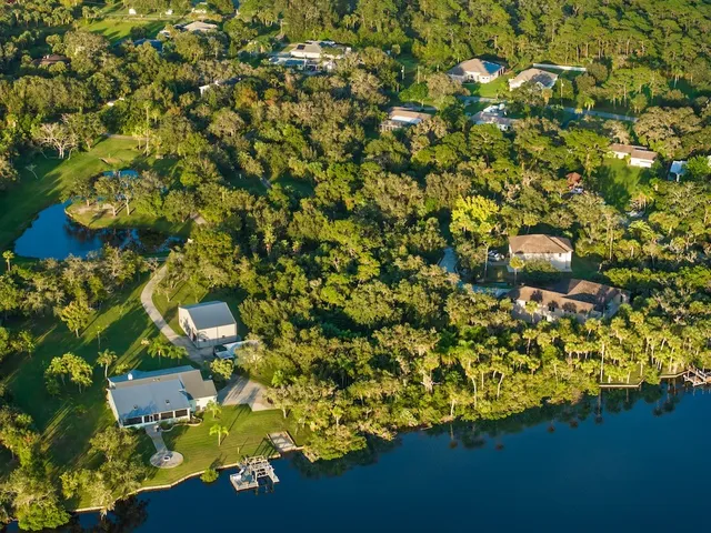 a view of lake with green space