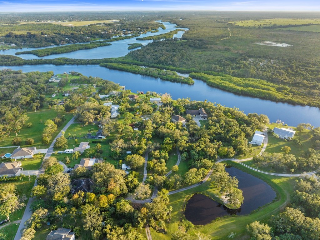 9598 Tortoise Lane Sebastian, FL 32976 - Photo 17 of 19 a view of an outdoor space and a lake view