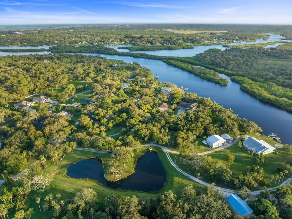 9598 Tortoise Lane Sebastian, FL 32976 - Photo 7 of 19 a view of lake with mountain