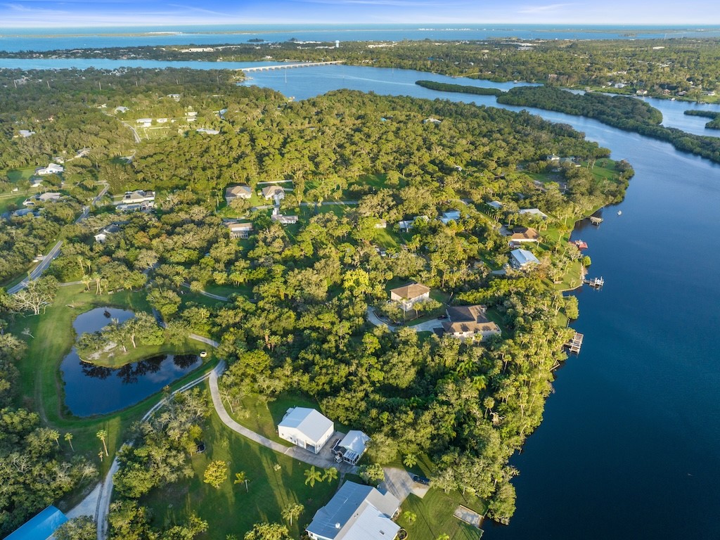 9598 Tortoise Lane Sebastian, FL 32976 - Photo 8 of 19 a view of a lake with a mountain