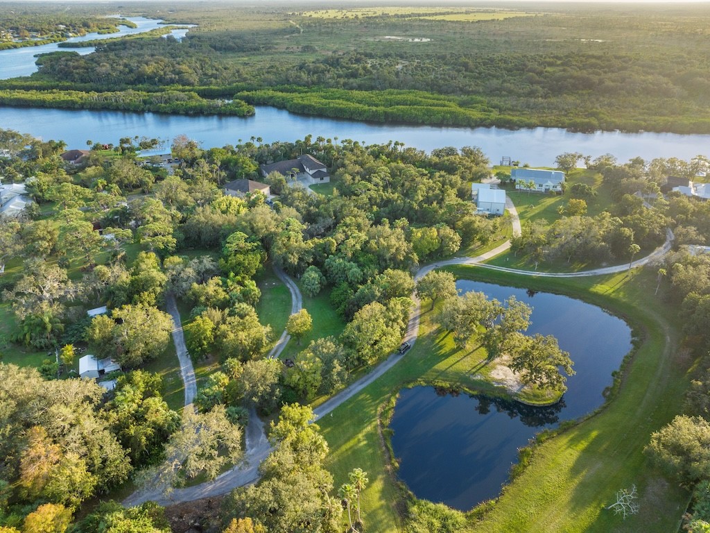 9598 Tortoise Lane Sebastian, FL 32976 - Photo 10 of 19 an aerial view of a house with a lake view