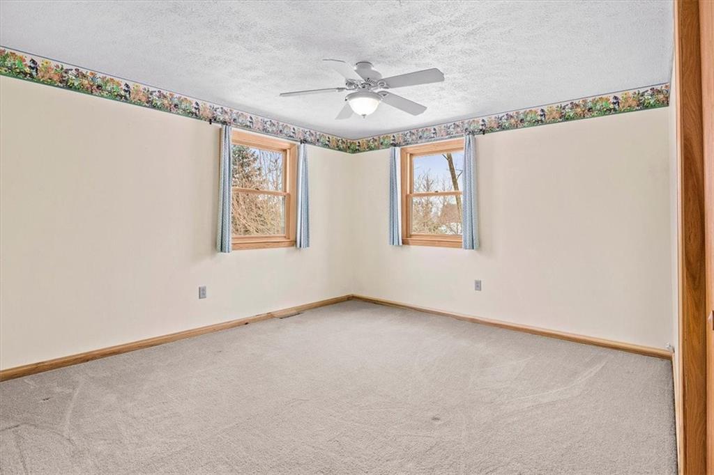 32 Canter Drive Sewickley, PA 15143 - Photo 19 of 25 a view of an empty room with a window