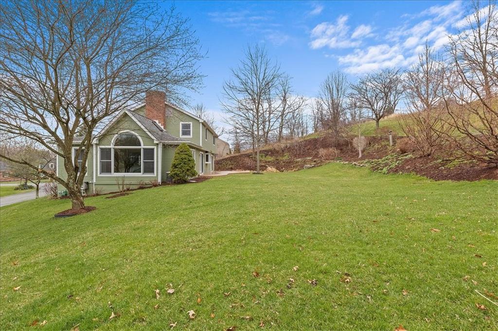 32 Canter Drive Sewickley, PA 15143 - Photo 21 of 25 a front view of a house with a yard