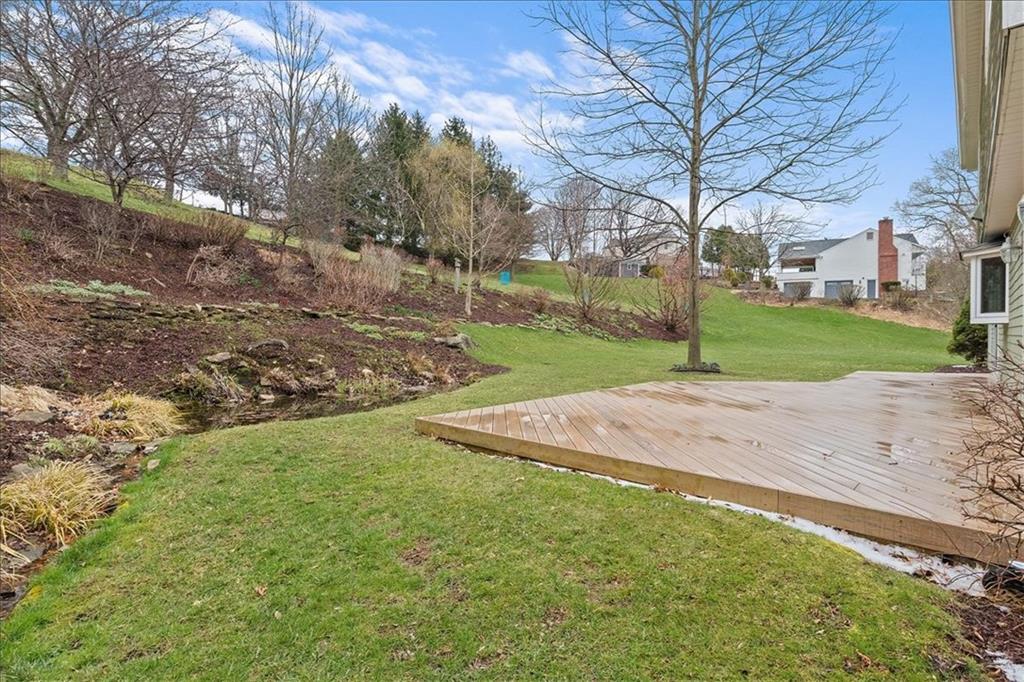 32 Canter Drive Sewickley, PA 15143 - Photo 22 of 25 a view of a yard with palm trees