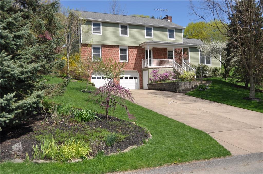 32 Canter Drive Sewickley, PA 15143 - Photo 25 of 25 a front view of a house with a yard and trees