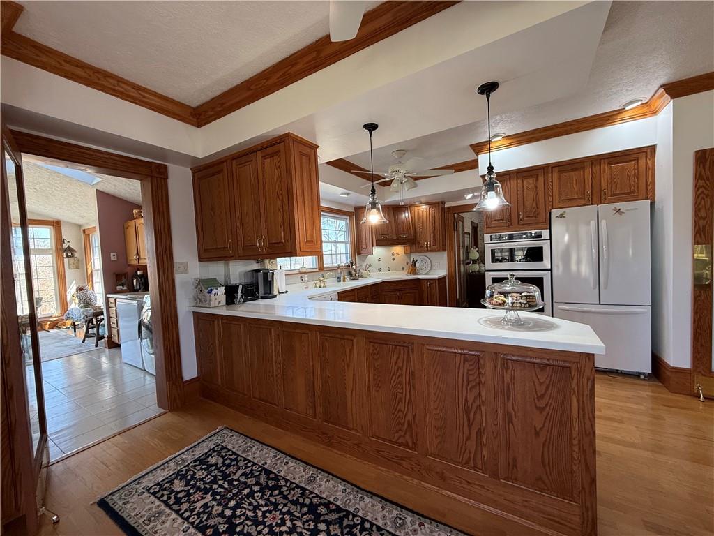 172 Valley Road Cranberry, PA 16319 - Photo 21 of 50 a kitchen with stainless steel appliances a refrigerator and a stove