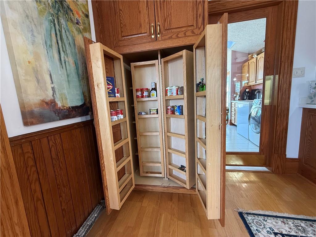 172 Valley Road Cranberry, PA 16319 - Photo 21 of 50 a view of walk in closet with clothes and shoes