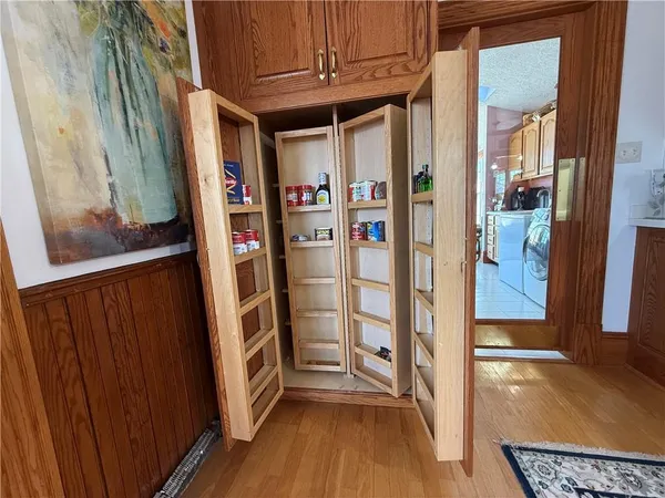 a view of a storage & utility room with washer and dryer