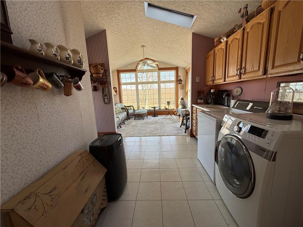 172 Valley Road Cranberry, PA 16319 - Photo 25 of 50 a view of a storage & utility room with washer and dryer