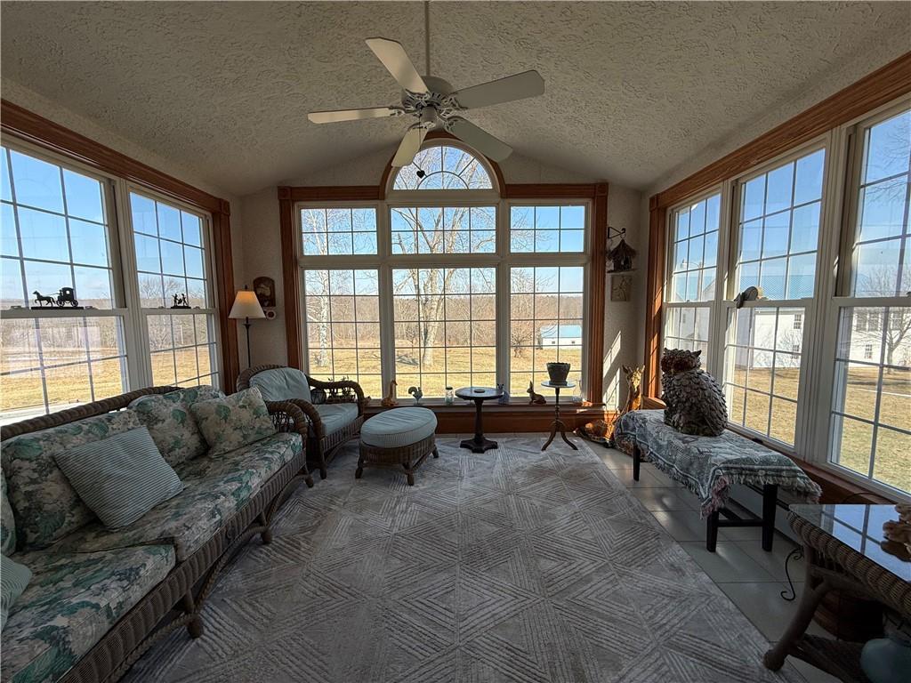 172 Valley Road Cranberry, PA 16319 - Photo 26 of 50 a living room with furniture and a floor to ceiling window