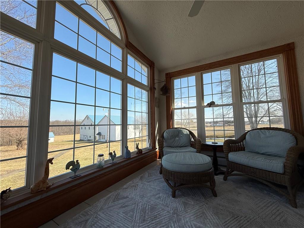 172 Valley Road Cranberry, PA 16319 - Photo 27 of 50 a living room with furniture and a floor to ceiling window