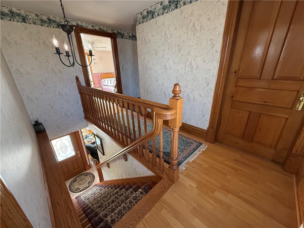 172 Valley Road Cranberry, PA 16319 - Photo 32 of 50 a view of entryway and hall with wooden floor