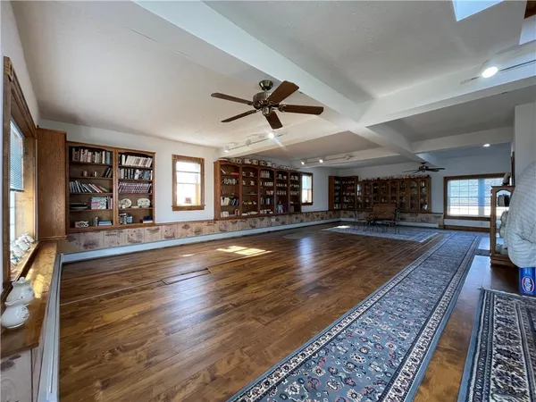 a view of a livingroom with wooden floor