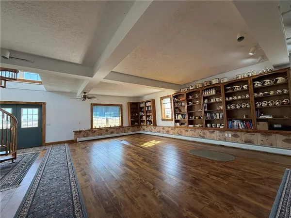 a view of entryway with wooden floor