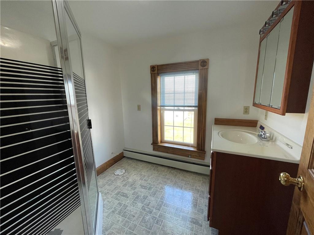 172 Valley Road Cranberry, PA 16319 - Photo 44 of 50 a bathroom with a sink toilet and window