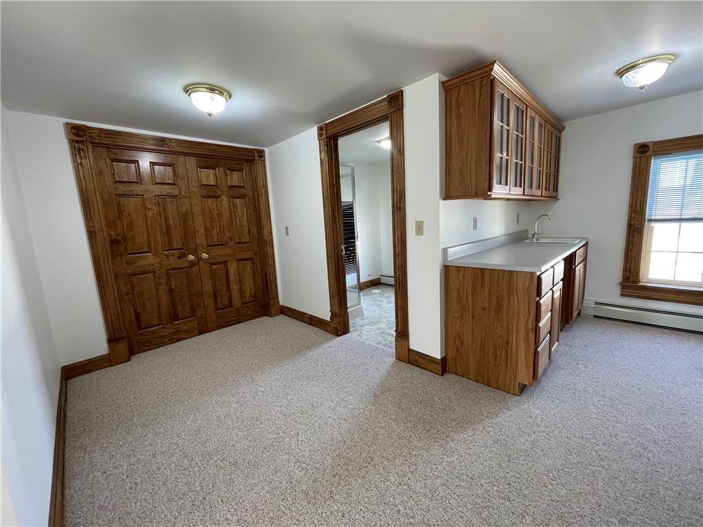 172 Valley Road Cranberry, PA 16319 - Photo 45 of 50 a view of an empty room with window and cabinet