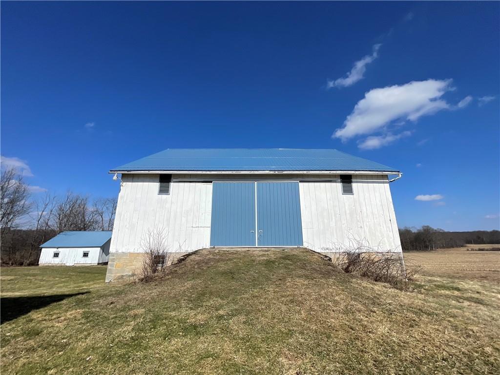 172 Valley Road Cranberry, PA 16319 - Photo 48 of 50 a front view of a house with a yard