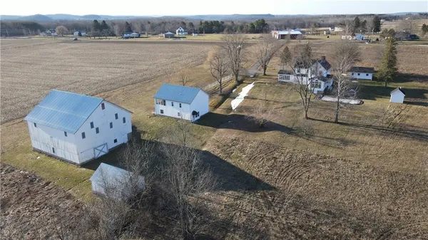 a aerial view of a house with lake view
