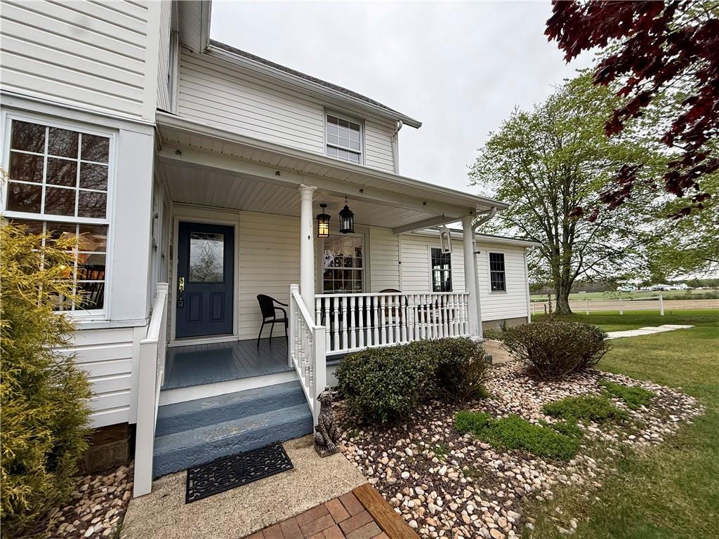 172 Valley Road Cranberry, PA 16319 - Photo 8 of 50 a front view of a house with garden