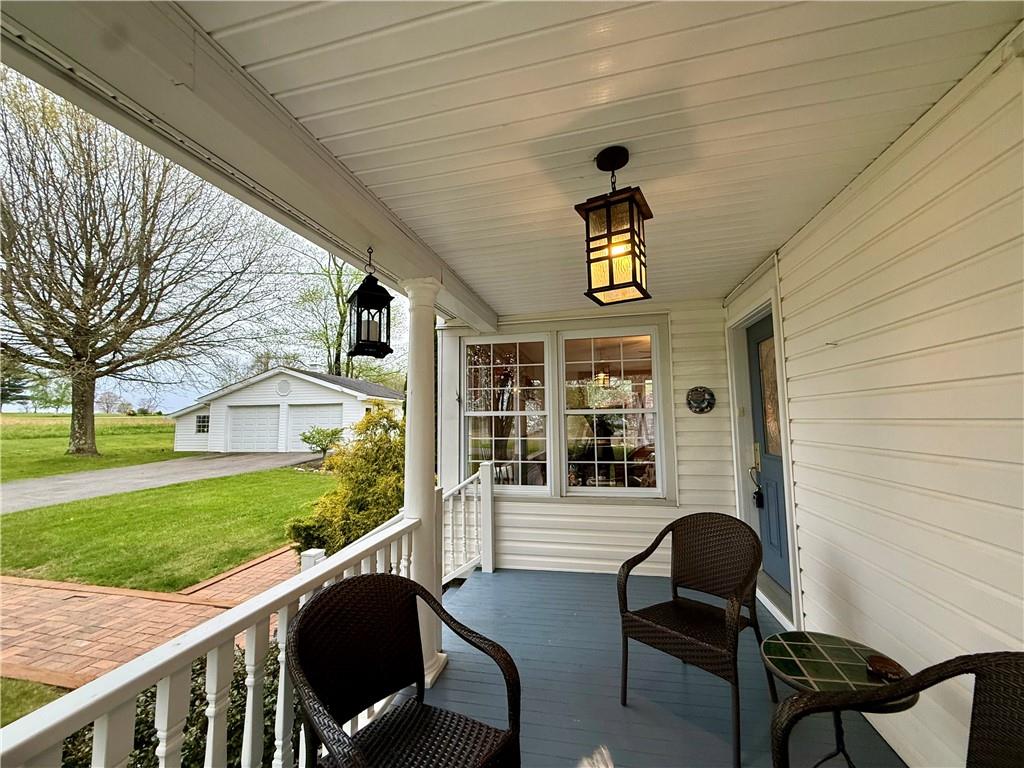 172 Valley Road Cranberry, PA 16319 - Photo 9 of 50 a view of a porch with chairs and backyard