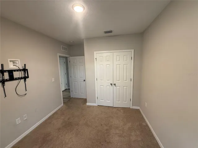 a view of a room with painted walls