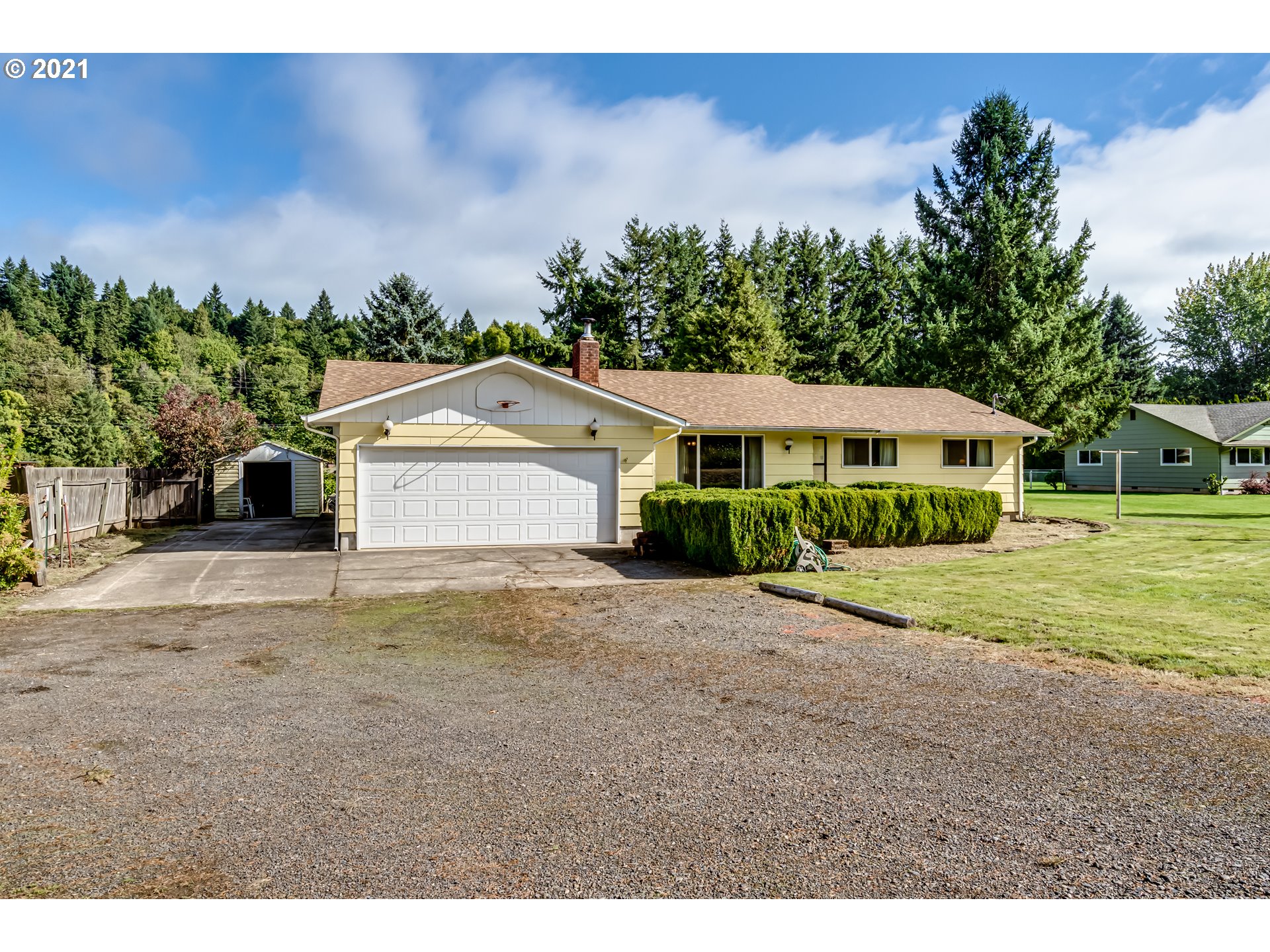 37771 Camp Creek Road Springfield, OR 97478 - Photo 2 of 30 a front view of a house with a yard and garage