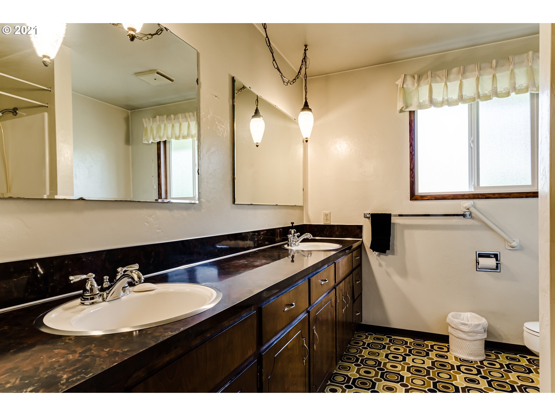 37771 Camp Creek Road Springfield, OR 97478 - Photo 13 of 30 a bathroom with a sink and a mirror