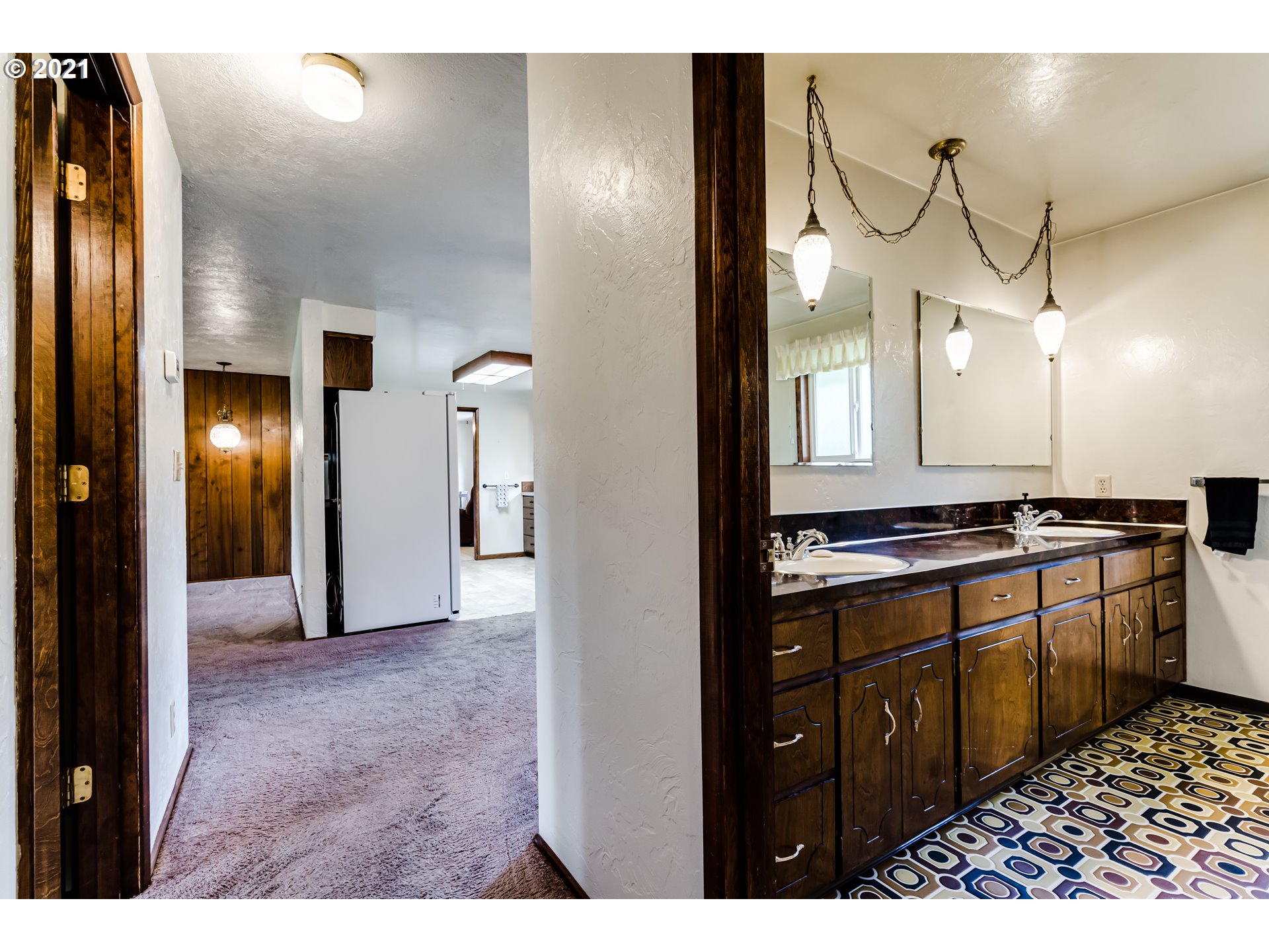 37771 Camp Creek Road Springfield, OR 97478 - Photo 14 of 30 a bathroom with a sink and a mirror