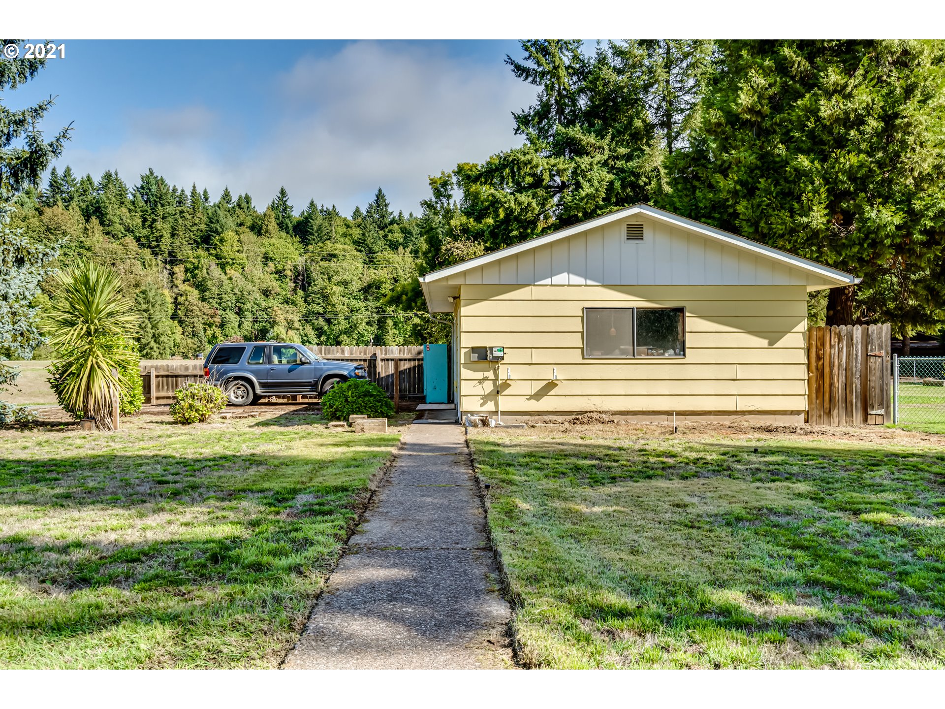 37771 Camp Creek Road Springfield, OR 97478 - Photo 22 of 30 a front view of a house with a yard
